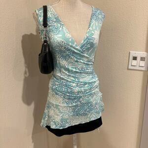 Partice Breal blue top.